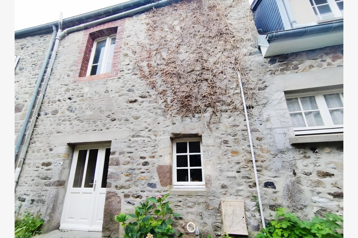 Maison mitoyenne des 2 côtés