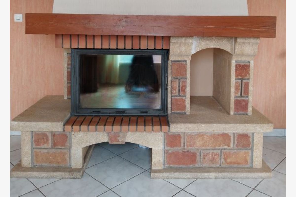 Cheminée avec insert en fonte