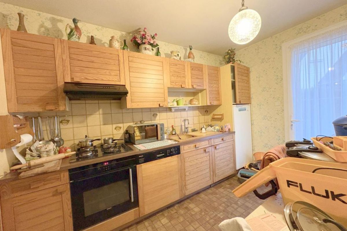 Photo 2 Une maison mitoyenne proche des commerces