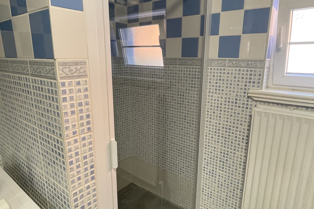 Ensemble porte de douche extensible 