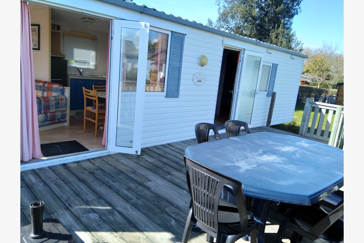 mobil home sur terrain privé viabilisé - 149870_6828b630ecc362-18027969.jpg