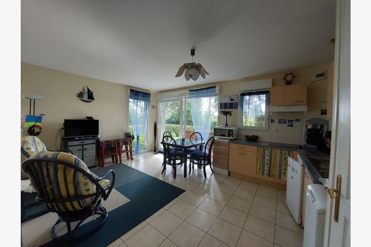 Photo 1 Appartement F2 avec jardin et parking