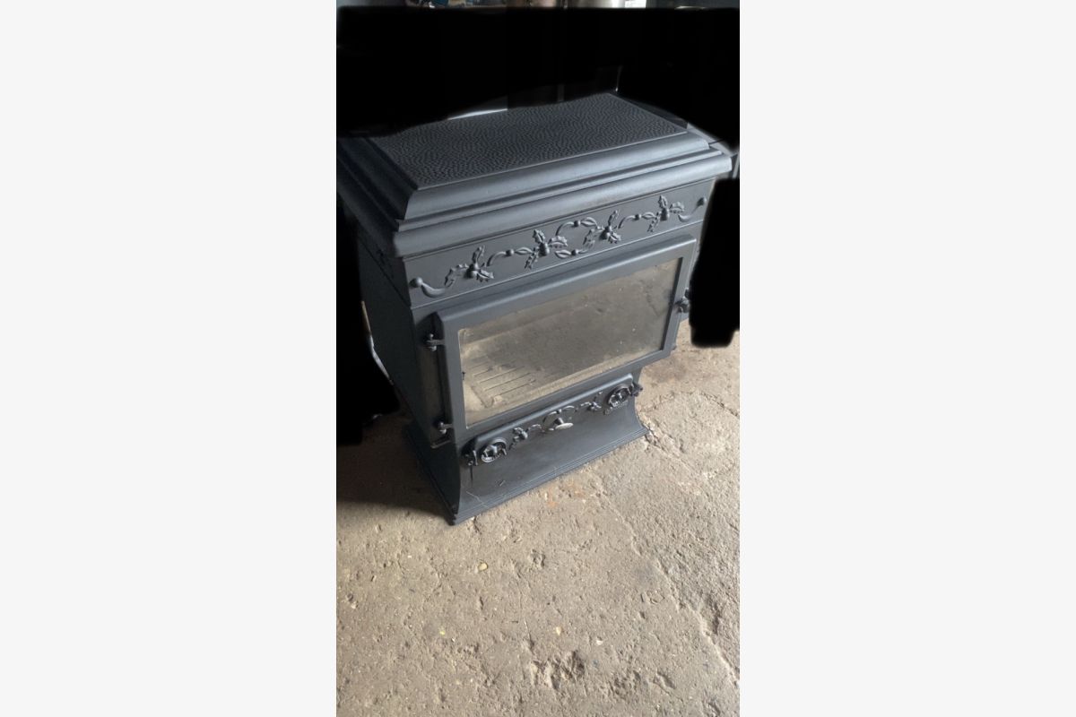 Photo 1 Poêle à bois invicta 8KW 