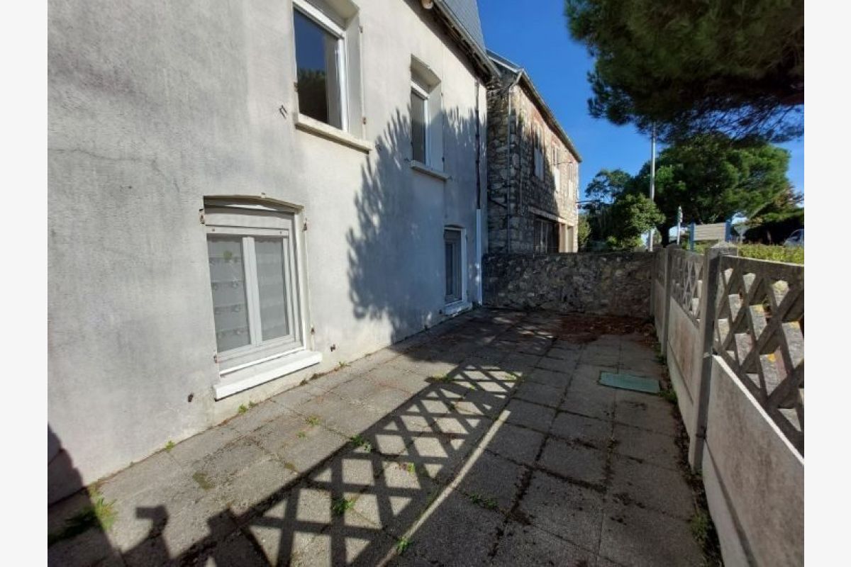 Photo 1 Appartement avec courette