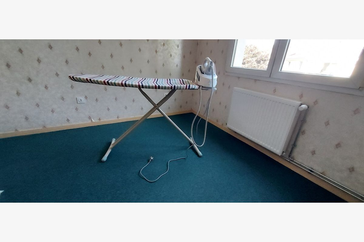 Photo 1 Central vapeur Braun avec housse et planche à repasser