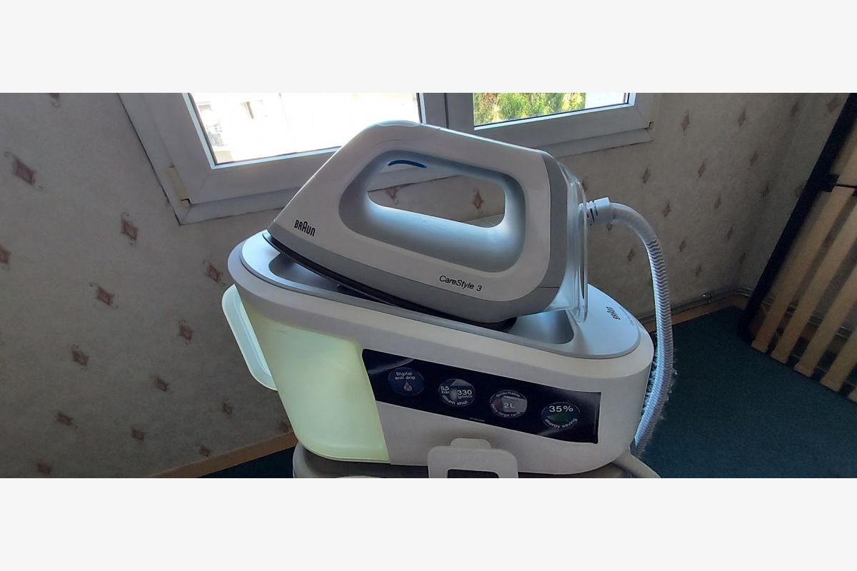 Central vapeur Braun avec housse et planche à repasser - 170864_d0731a0448cbce49dc764155e3701a38.jpg