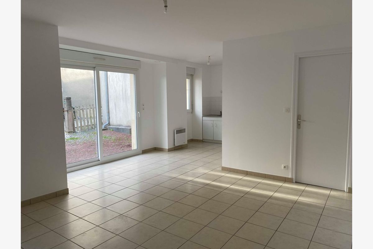 Photo 1 Appartement rez-de-chaussée