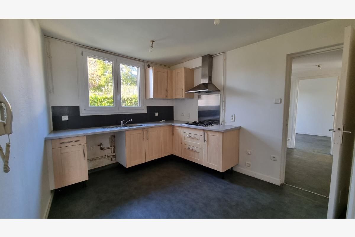 Photo 1 dans immeuble, à v. appt lumineux de 73 m2, au 1er étage com