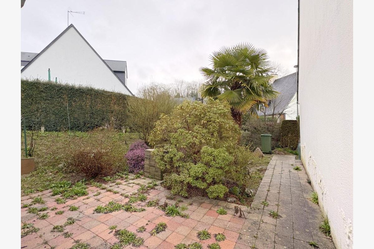 Une maison mitoyenne proche des commerces - 181521_10.jpg