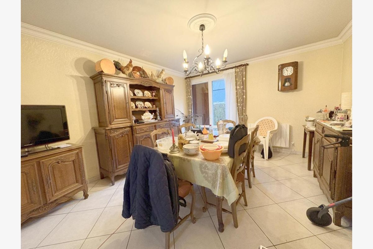 Une maison mitoyenne proche des commerces - 181521_2.jpg