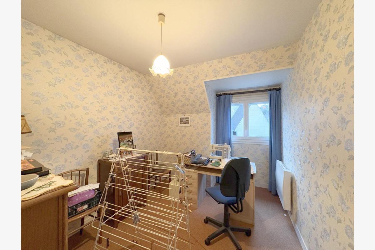 Une maison mitoyenne proche des commerces - 181521_6.jpg