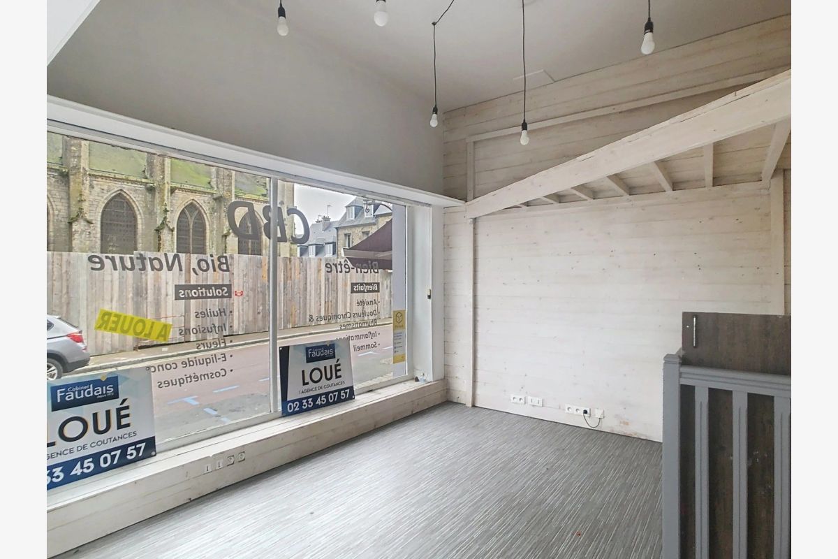 Photo 1 au coeur de la ville, exclu, loue local commercial de 25,49