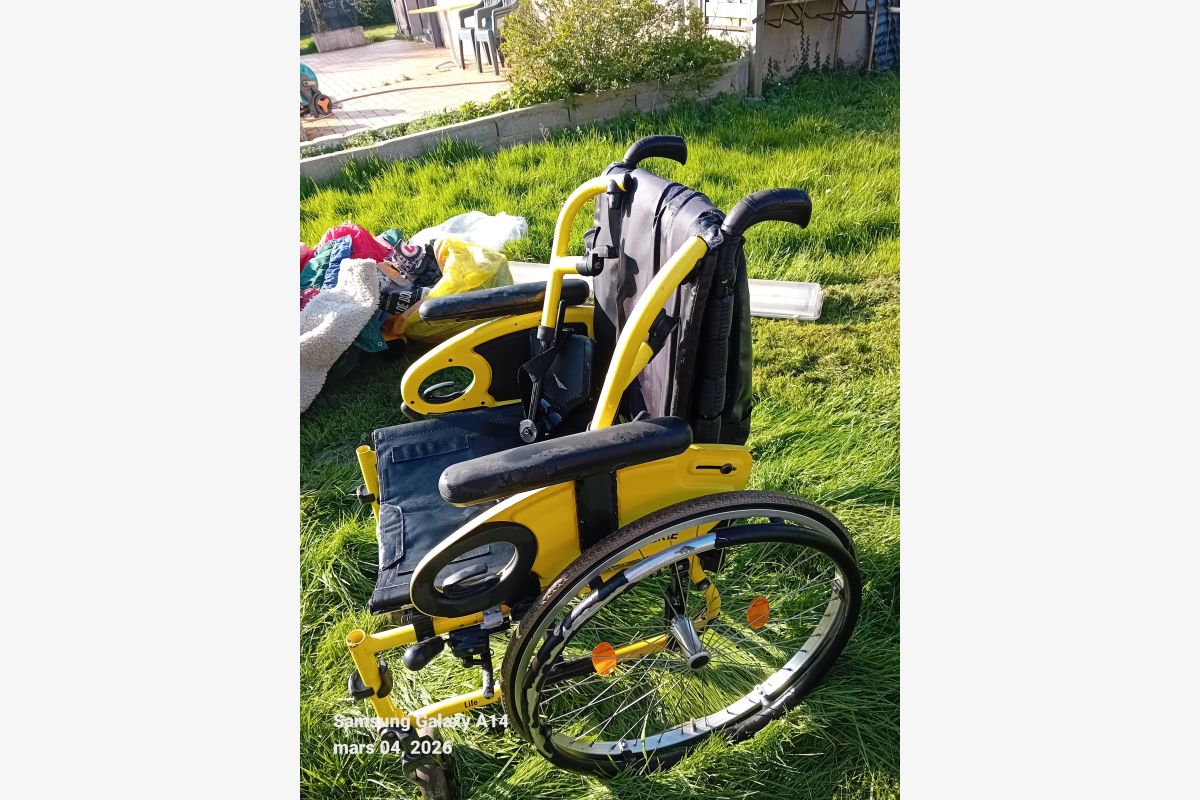 Photo 1 Fauteuil roulant