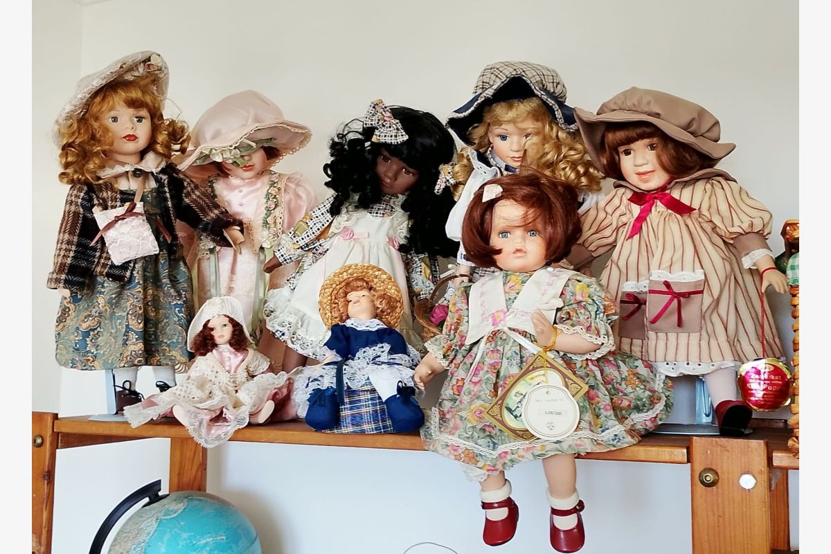 Photo 1 poupées porcelaine