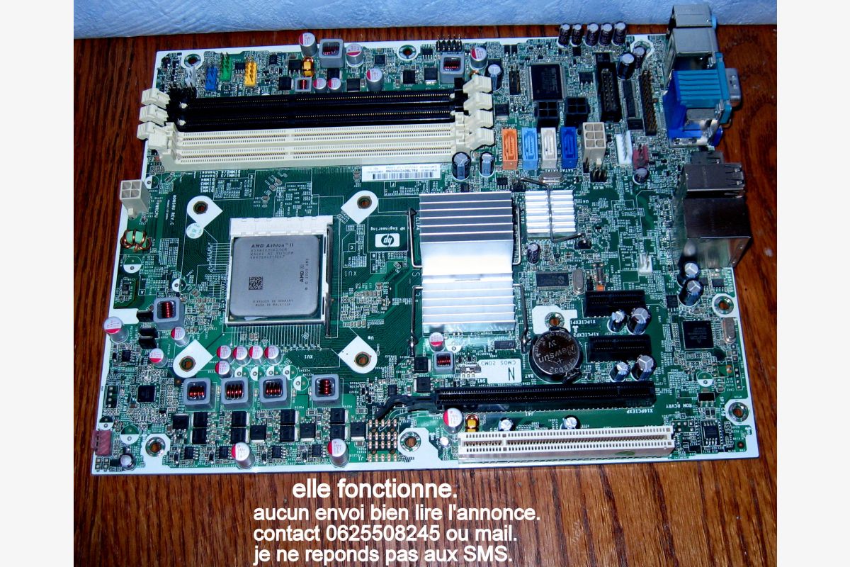 Photo 1 carte mere HPcompaq +ram+processeur+refroidisseur.