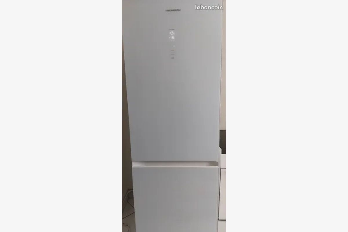 Photo 1 Combiné frigo - congélateur