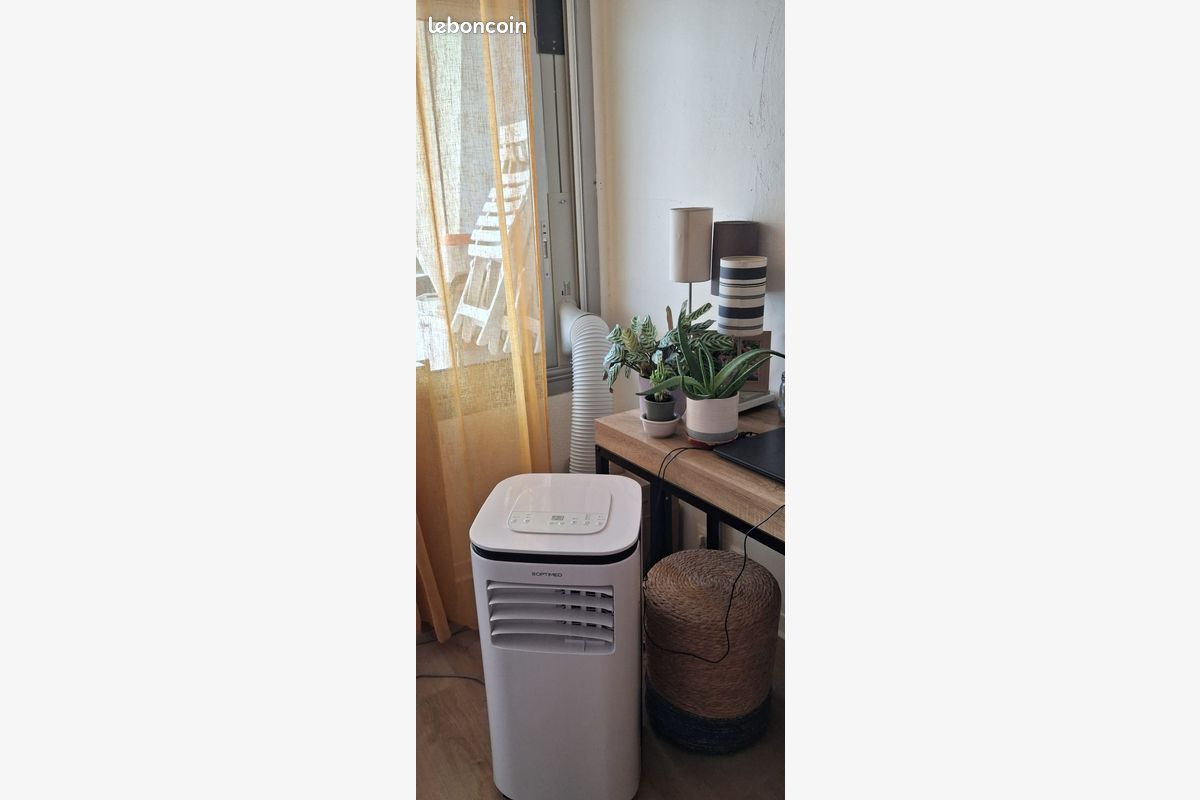 Photo 1 Vends climatiseur portable Optimea 7k