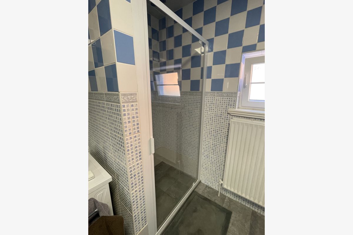 Photo 1 Ensemble porte de douche extensible 