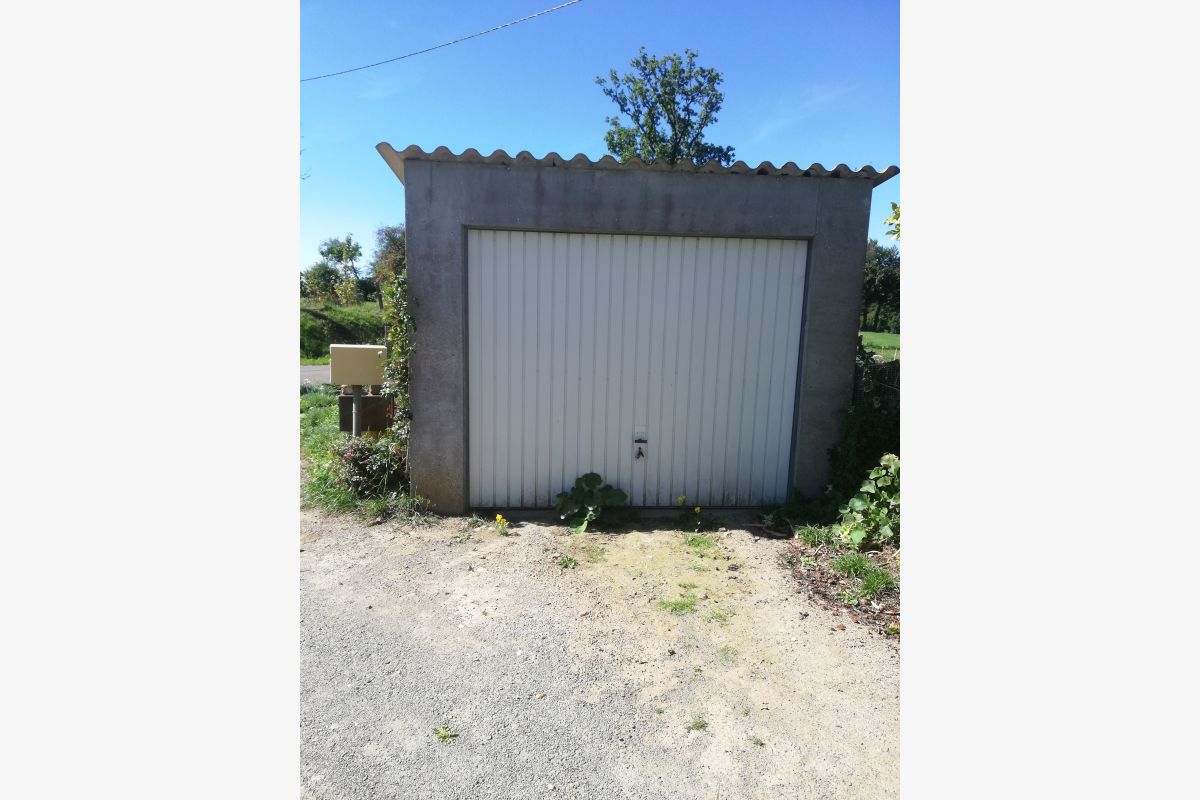 Photo 1 A vendre garage