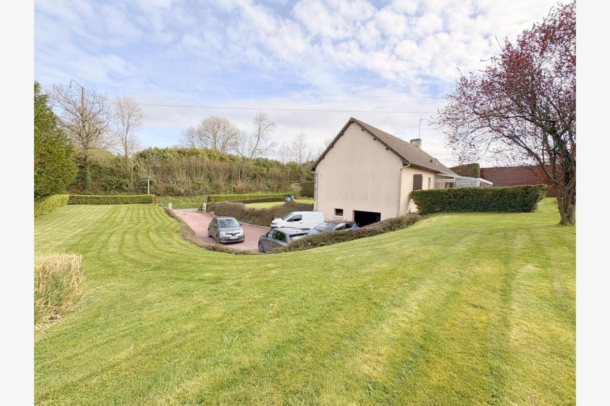 Une maison sur soul-sol située à Anctoville sur Boscq - 302731_13.jpg