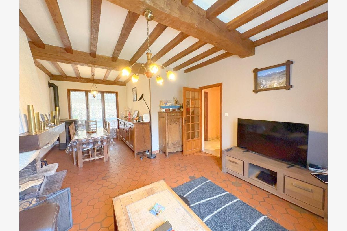 Une maison sur soul-sol située à Anctoville sur Boscq - 302731_2.jpg